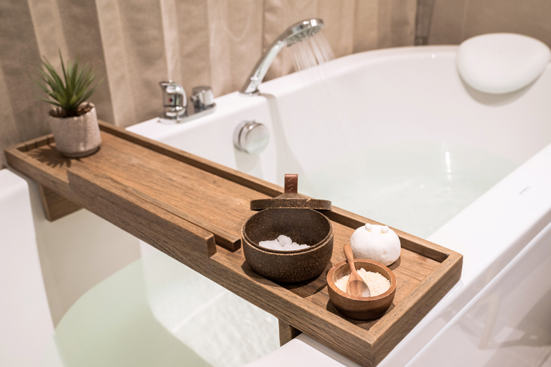 Bath tub with epsom salts and running water.