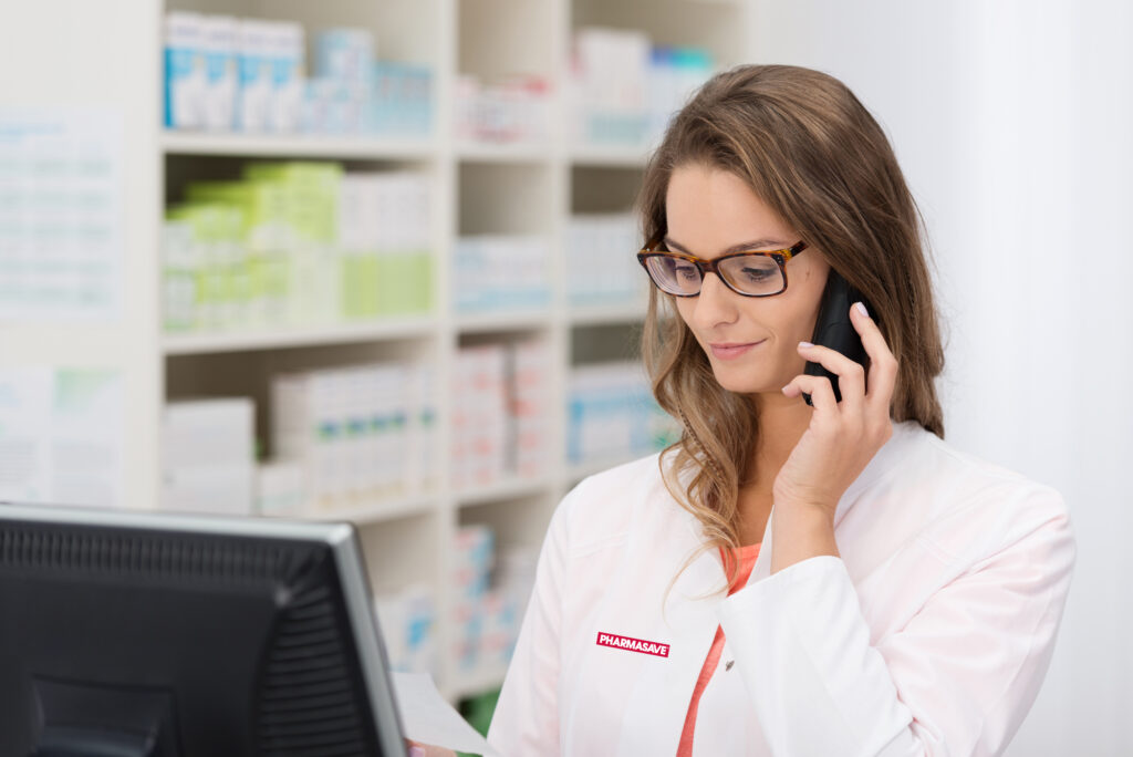 pharmacist looking at computer screen